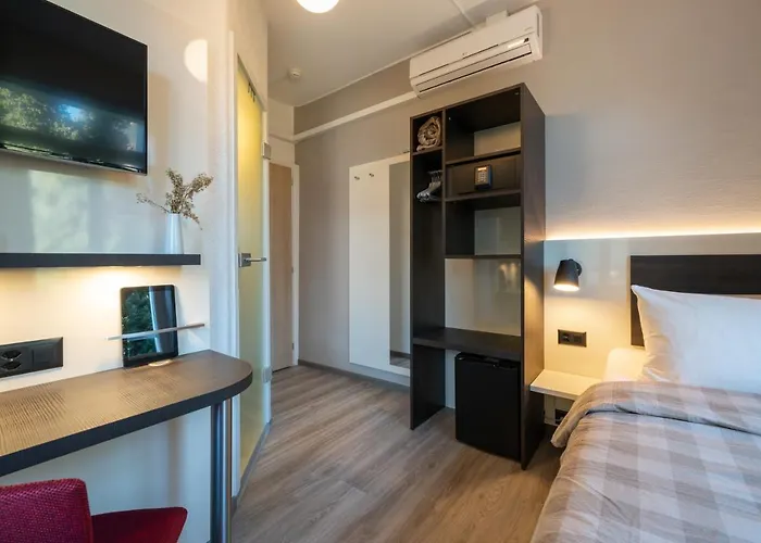 Отель Derby - Self Check-in Интерлакен